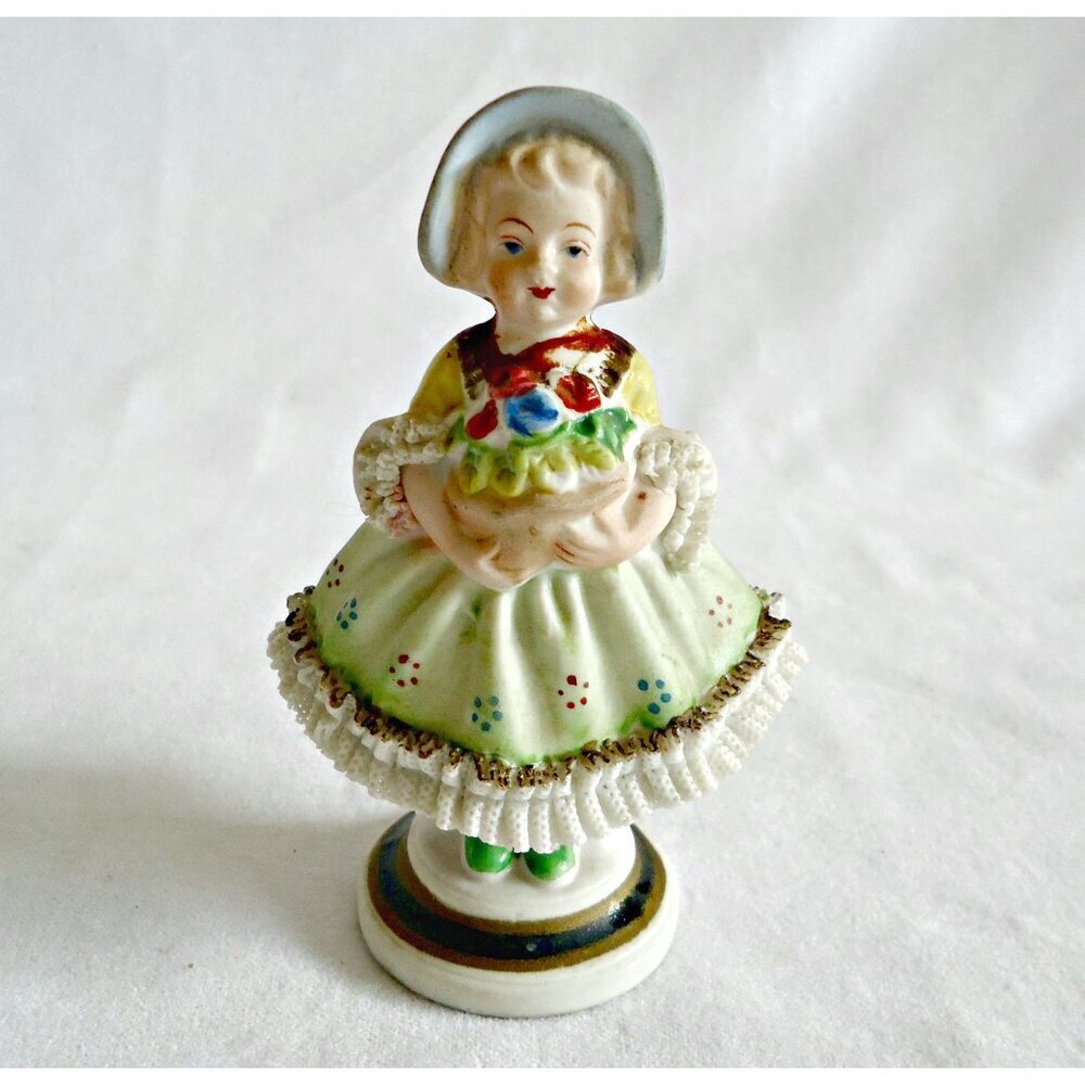 Occupied Japan Bisque Girl with Basket of Flowers Figurine